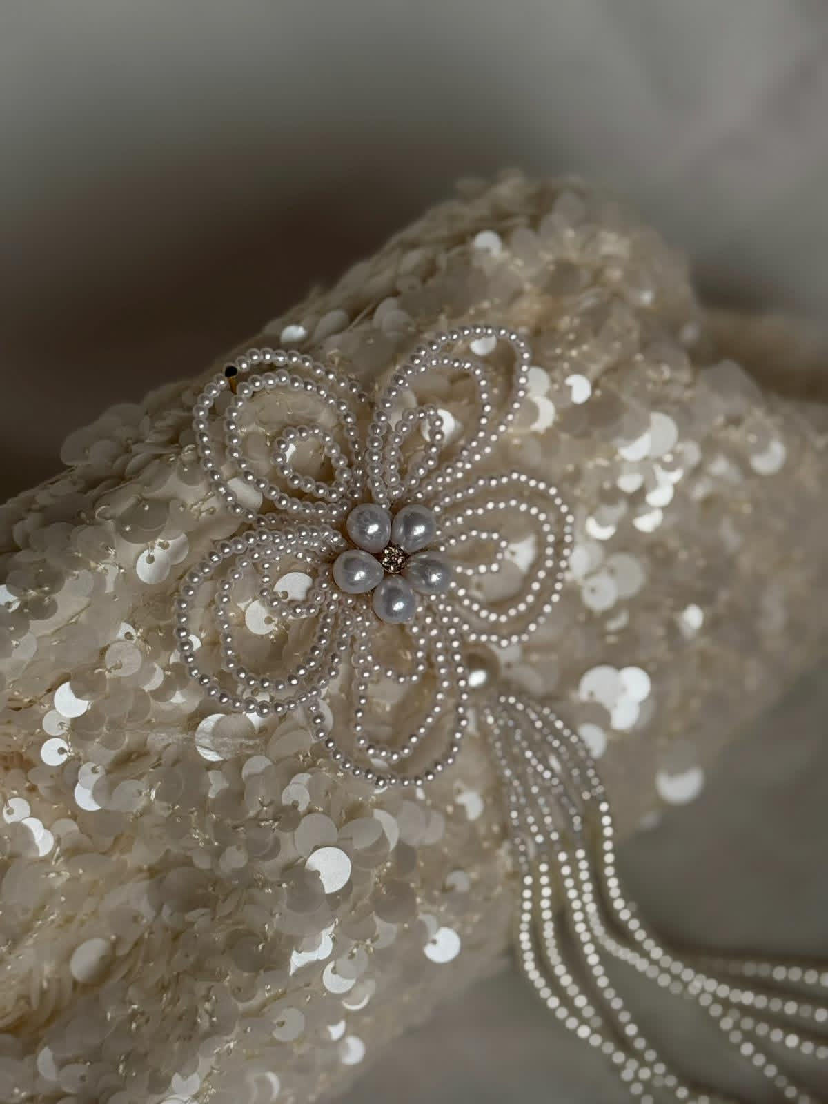 Pearly offwhite sequin clutch