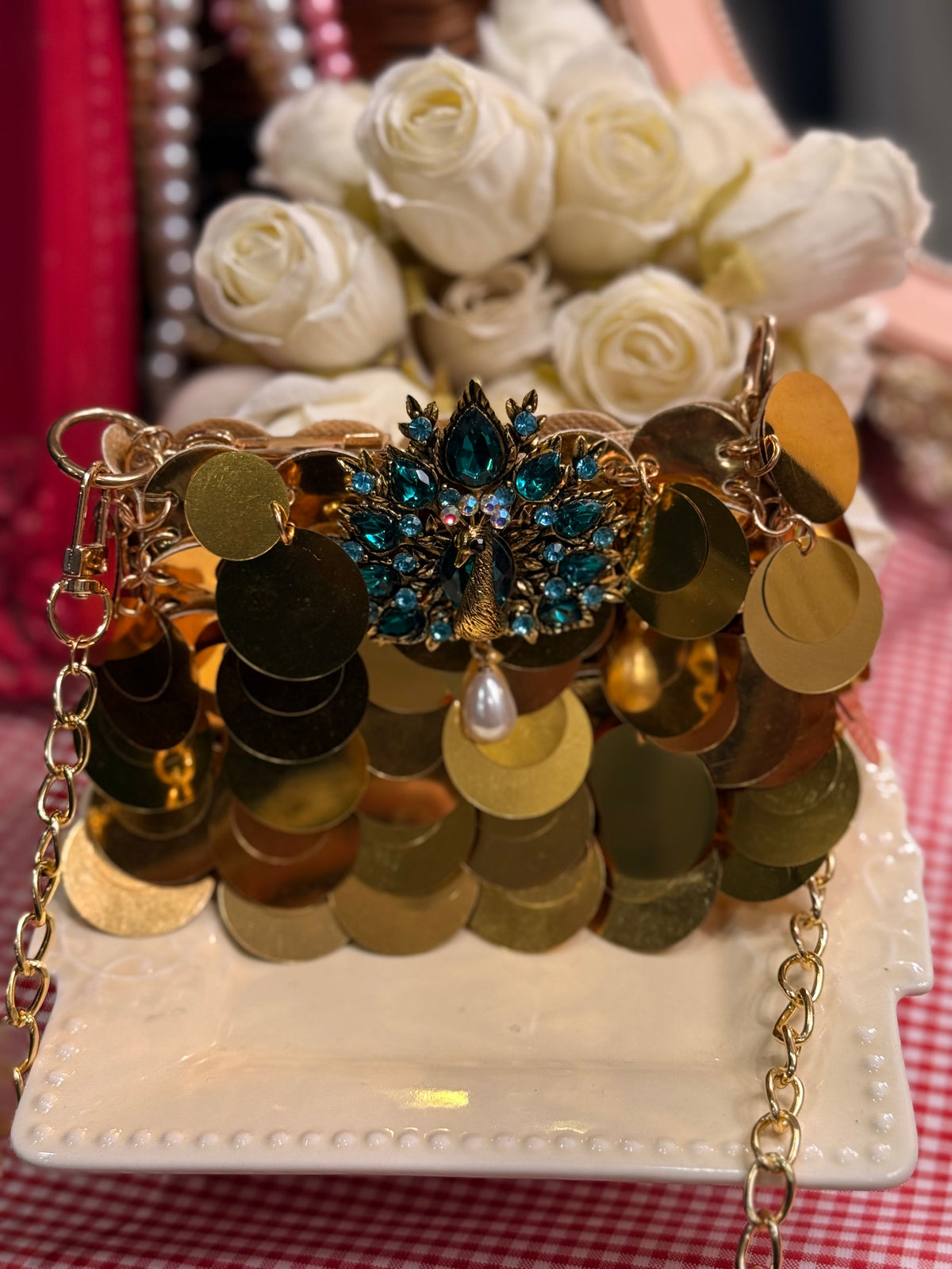 Gold faux sequin mini clutch with peacock embellishments