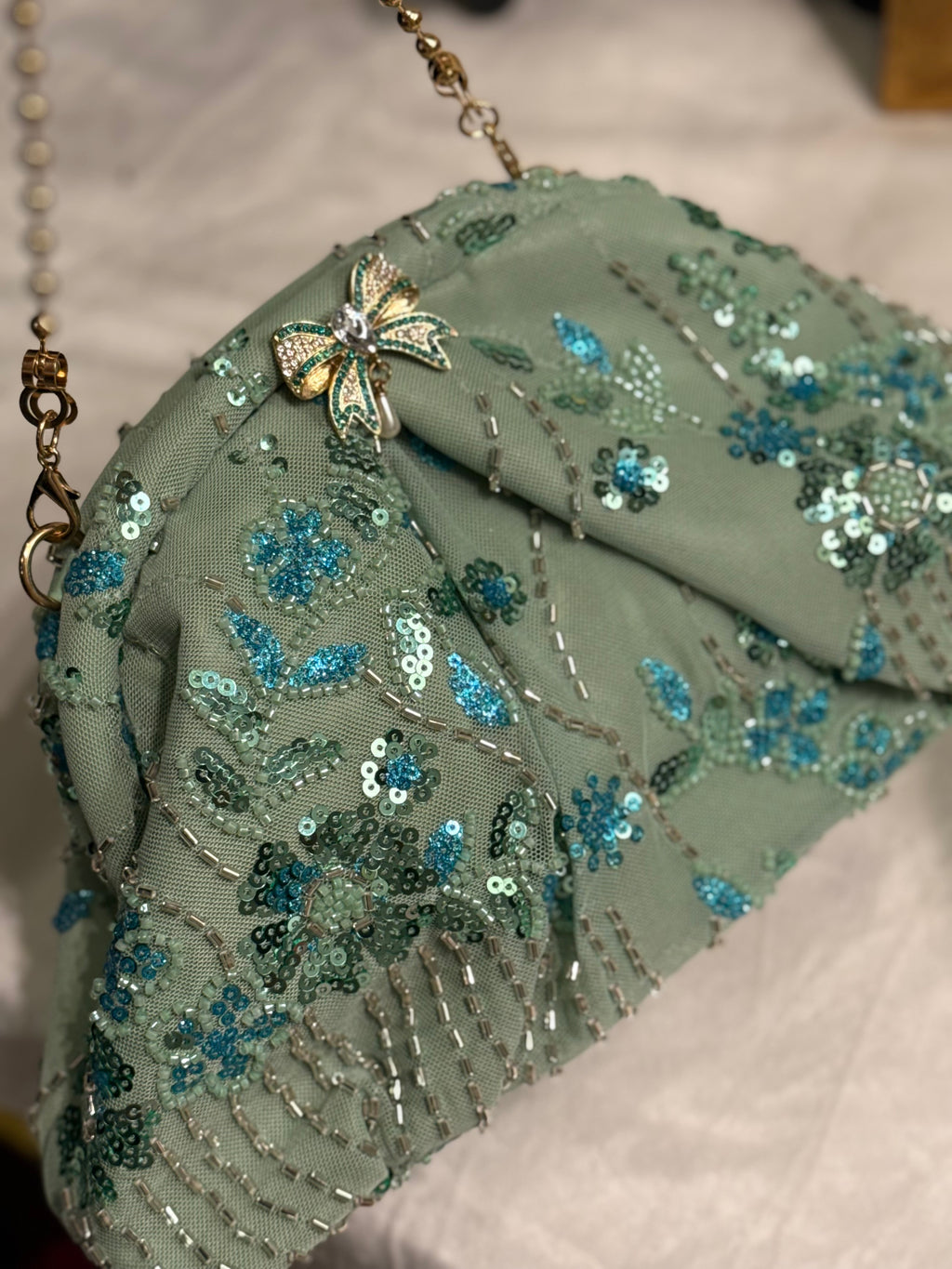 Hand embellished clutch