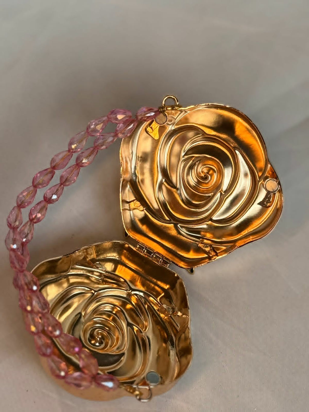 Gold base hot pink rose clutch