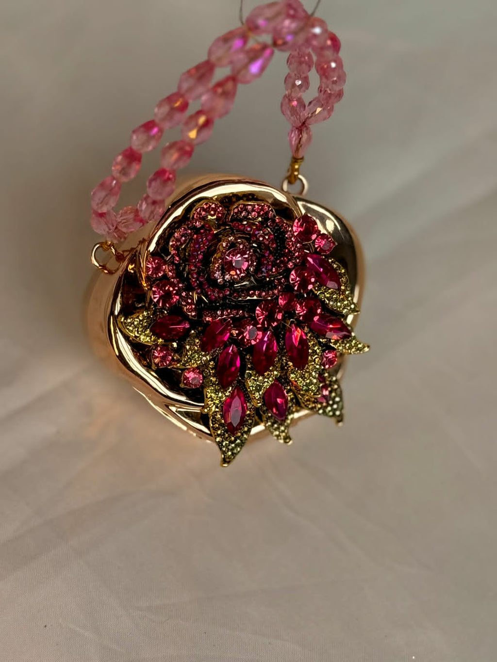 Gold base hot pink rose clutch