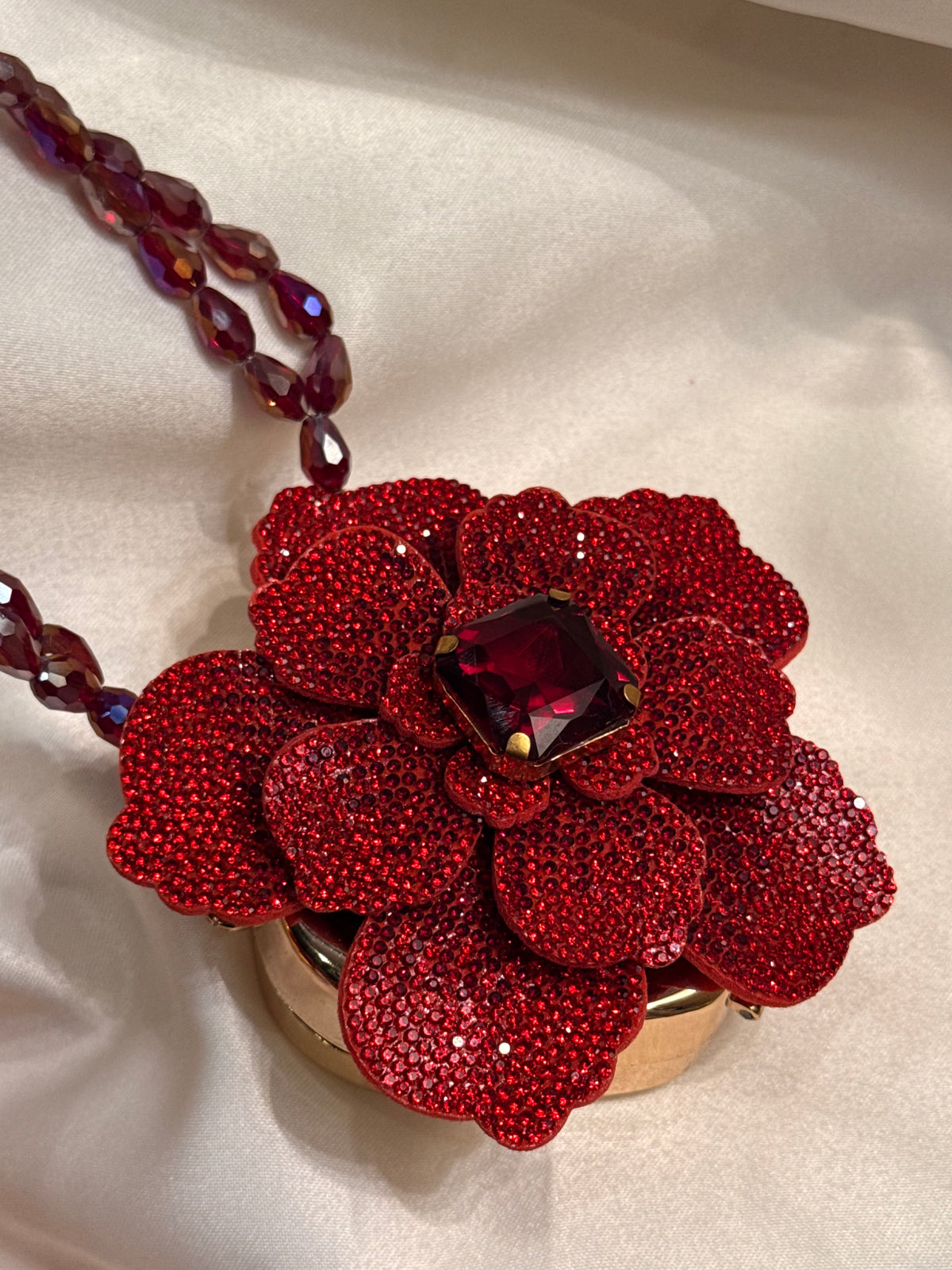 Maroon rose flower clutch