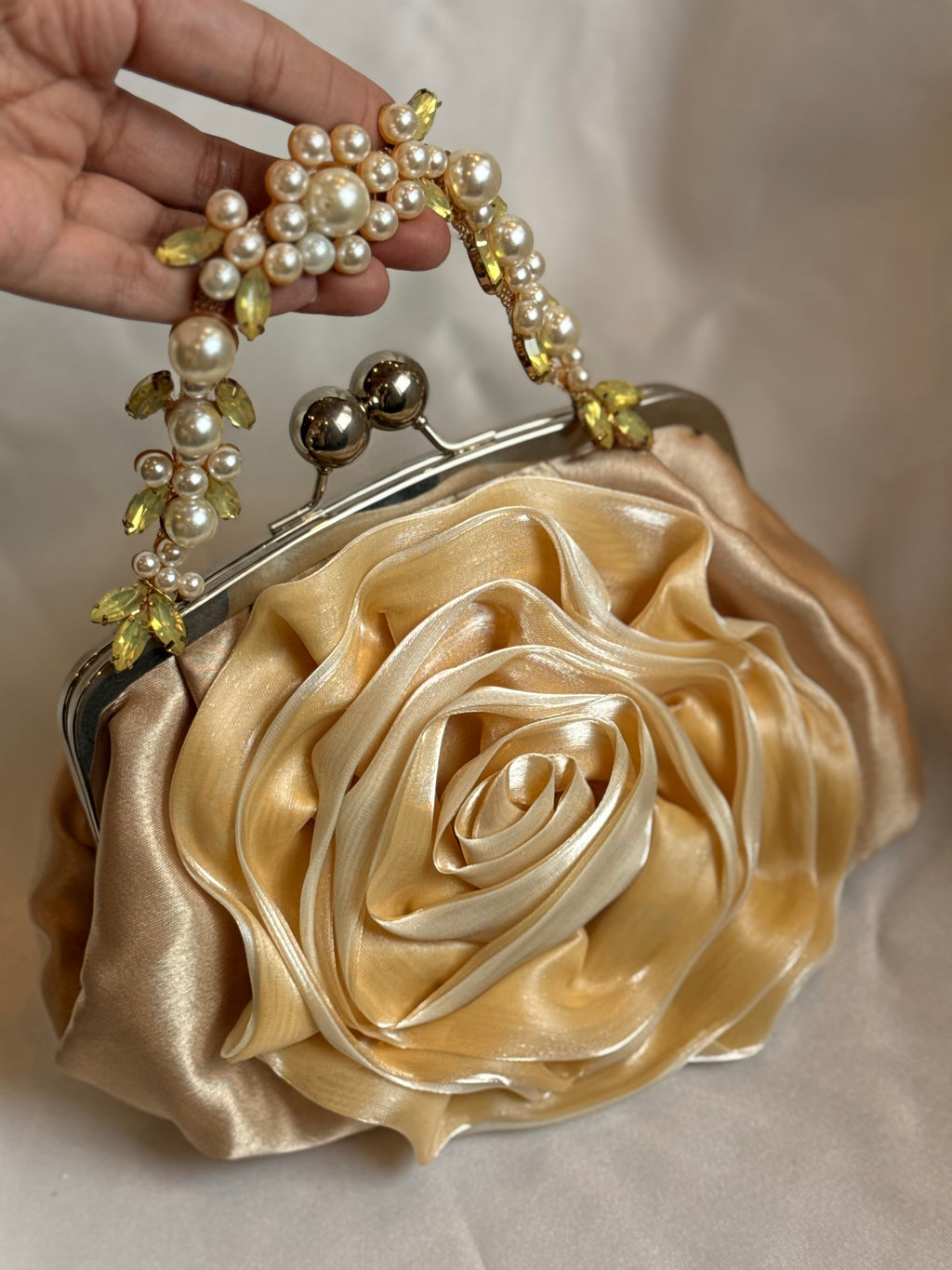 Gold rose clutch