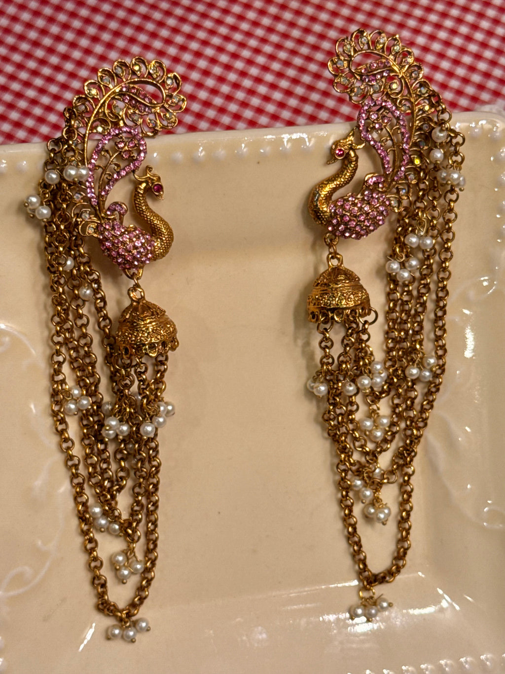Pink peacock clip pair