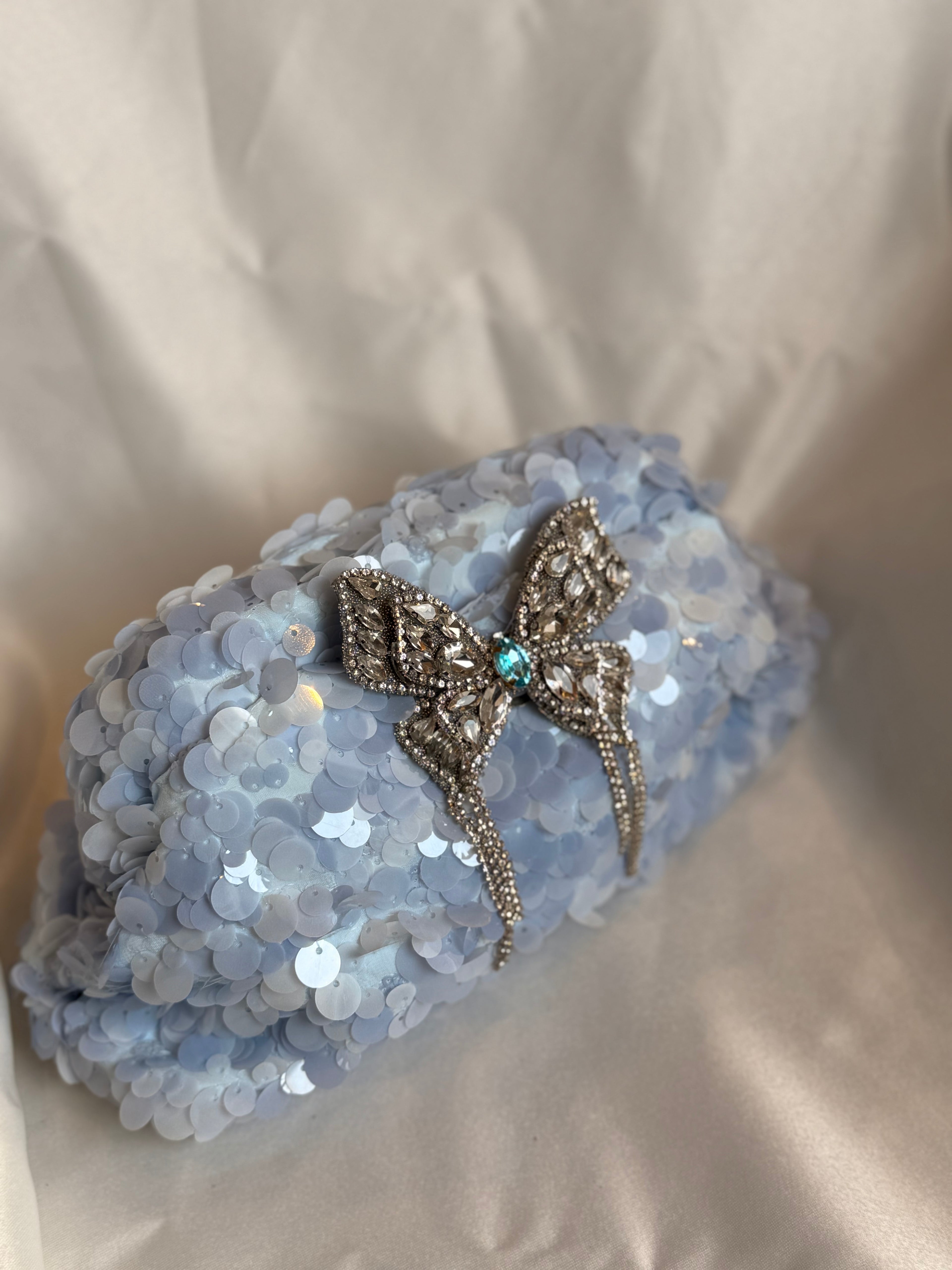 Powder blue sequin clutch