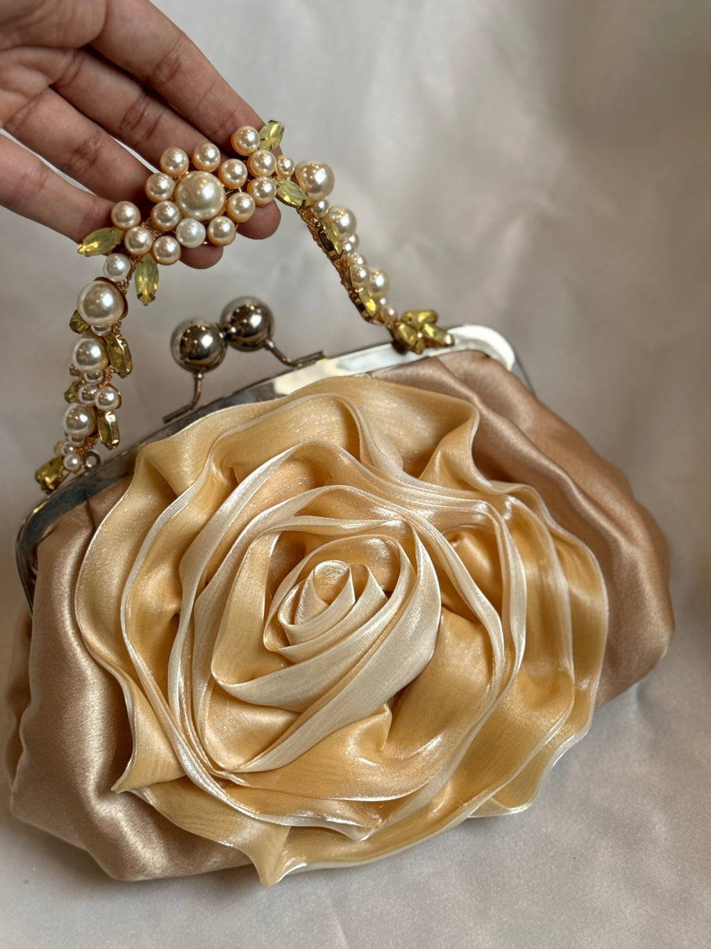 Gold rose clutch
