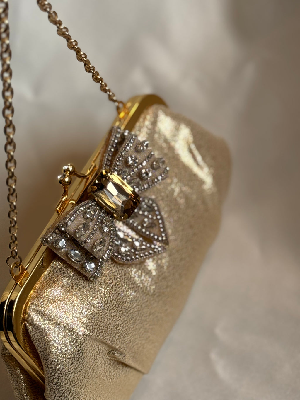 Gold bow embellished
