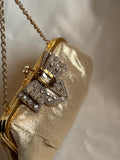 Gold bow embellished