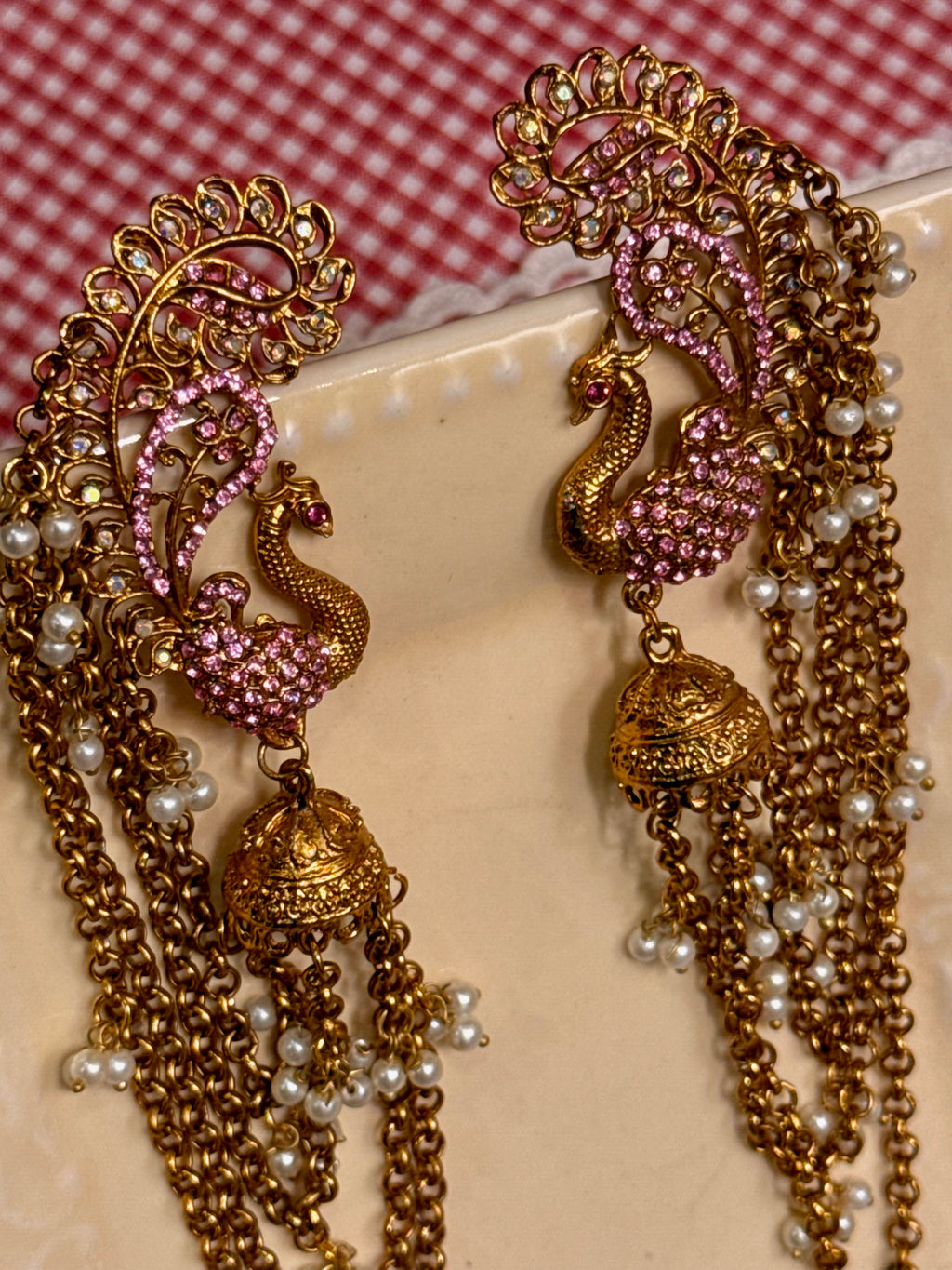 Pink peacock clip pair