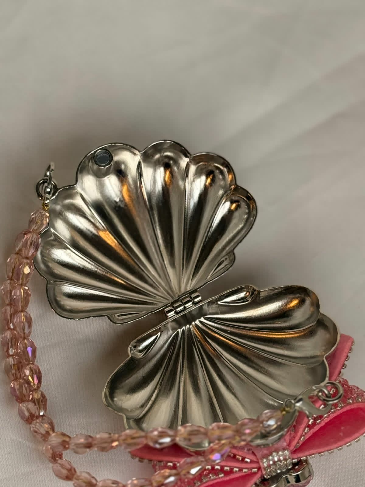 Silver base with pink embellished bow