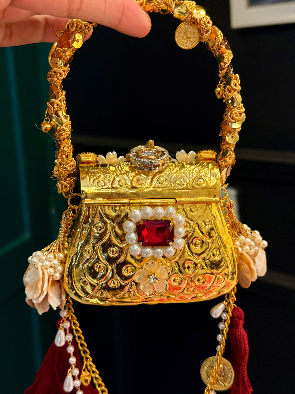 Indian clutch with maroon embellishments