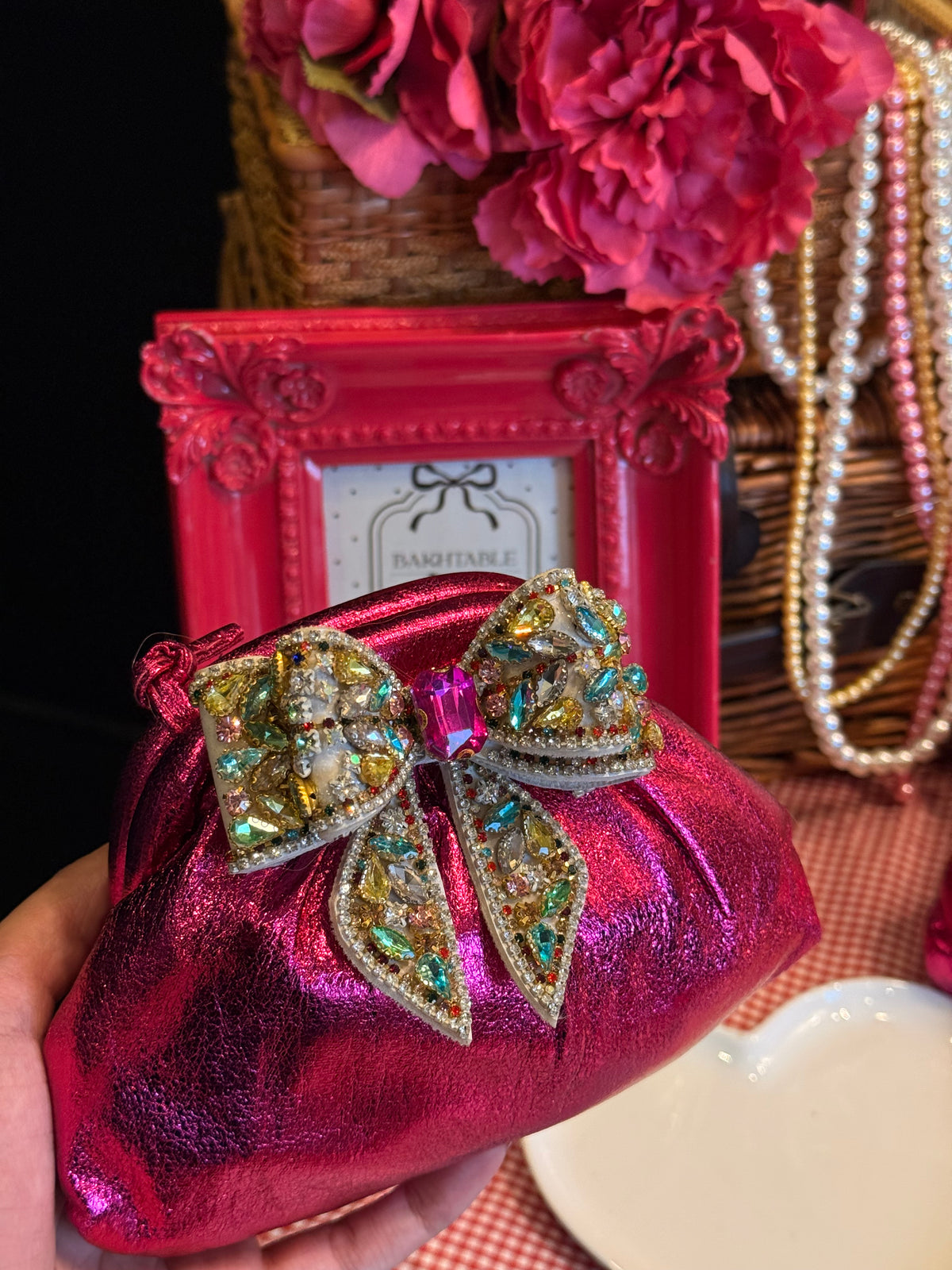 Hot pink clutch with multi rhinestone bow