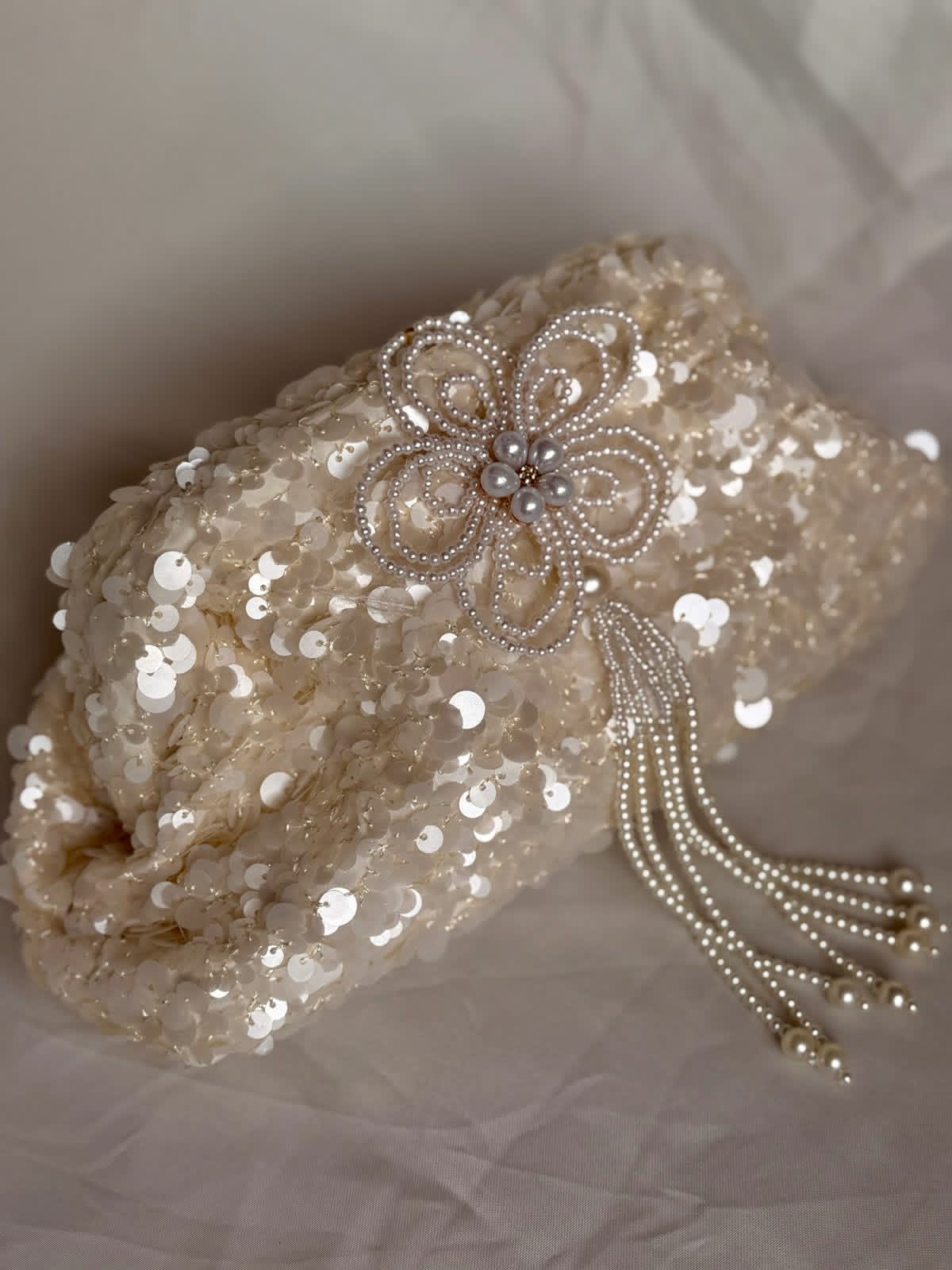 Pearly offwhite sequin clutch