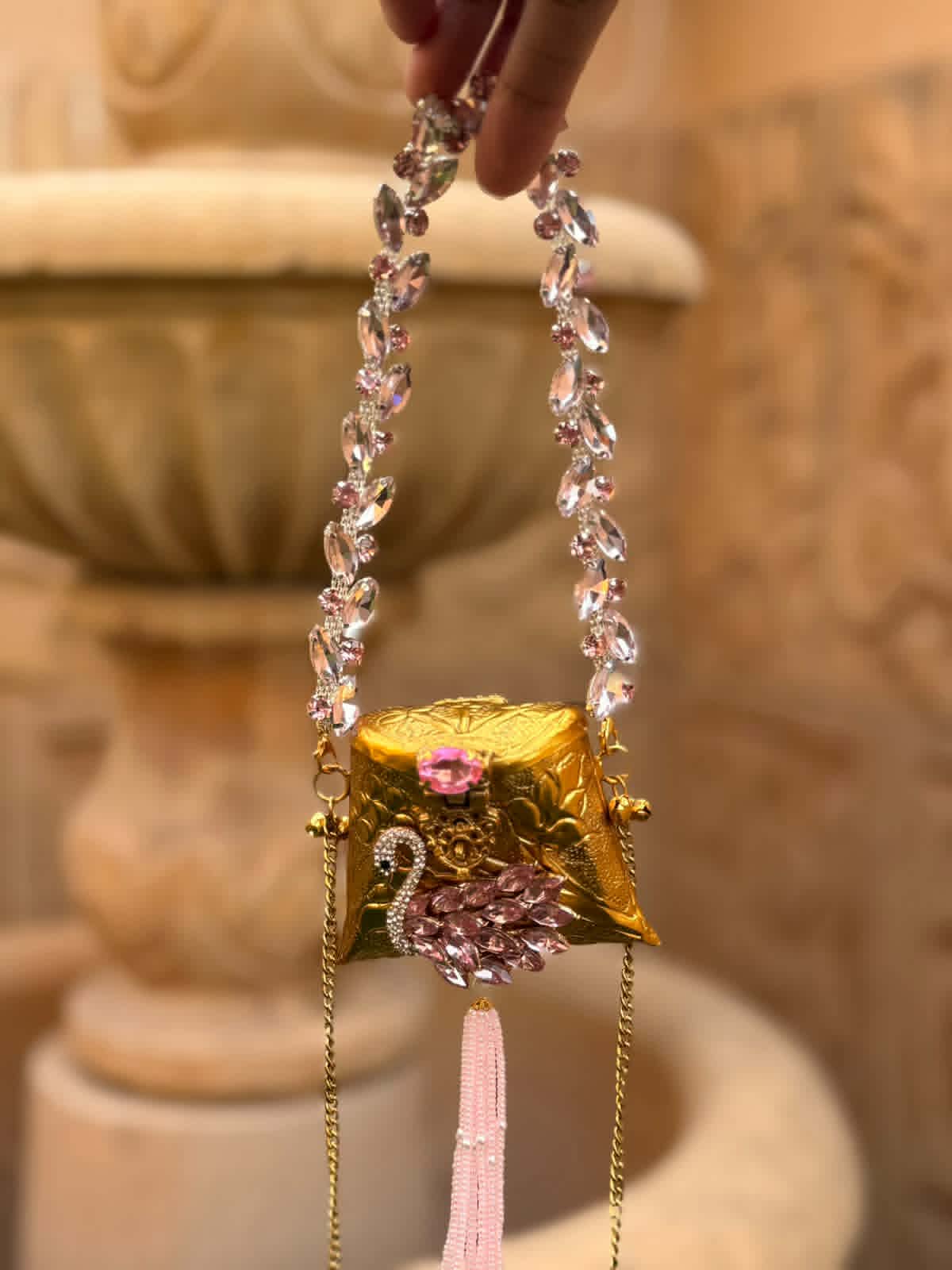 Mini nano clutch with pink swan embellishments