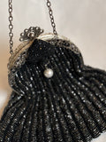 Vintage black knitted clutch