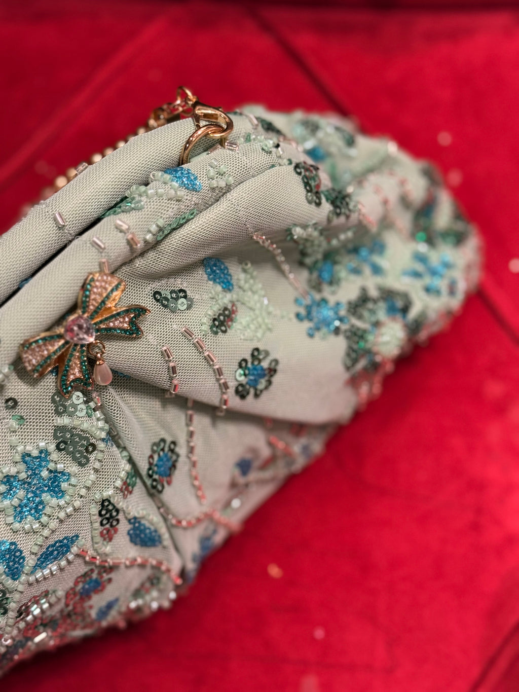 Hand embellished clutch