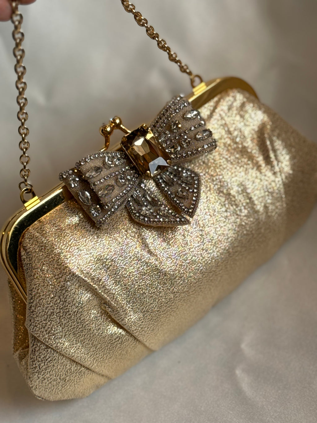 Gold bow embellished