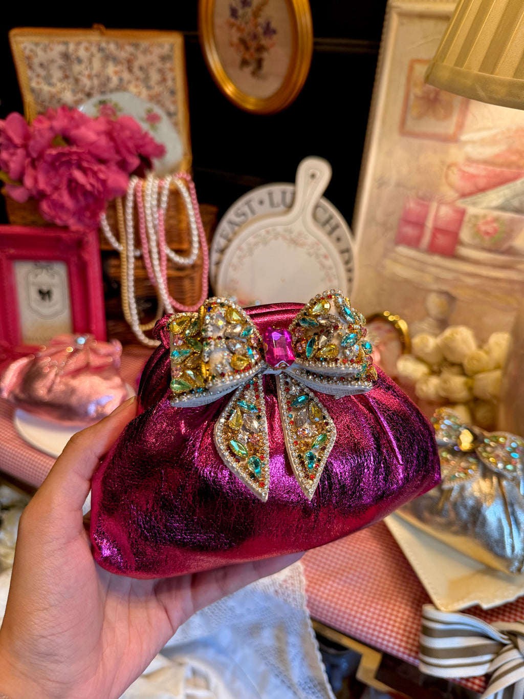 Hot pink clutch with multi rhinestone bow