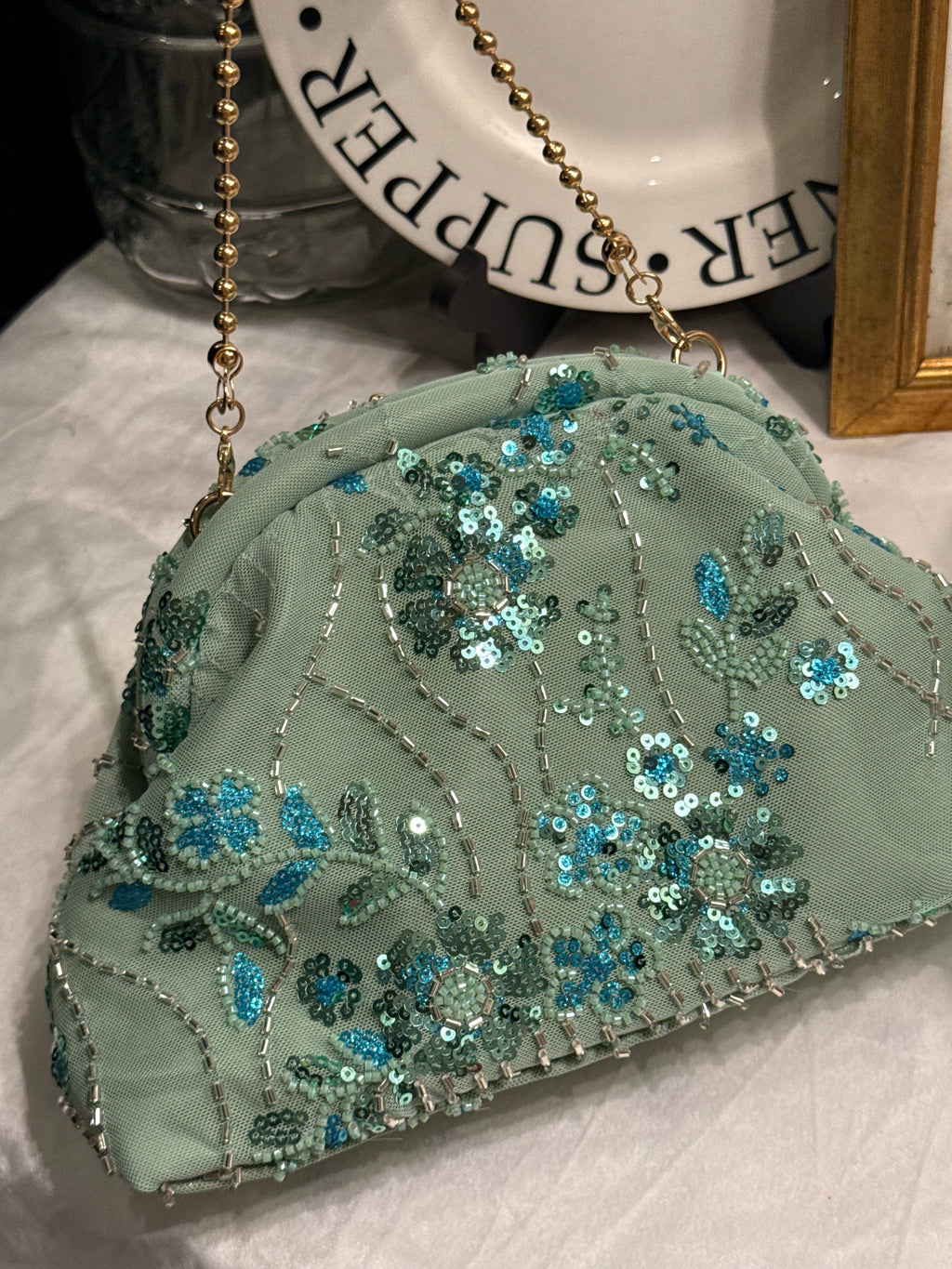 Hand embellished clutch