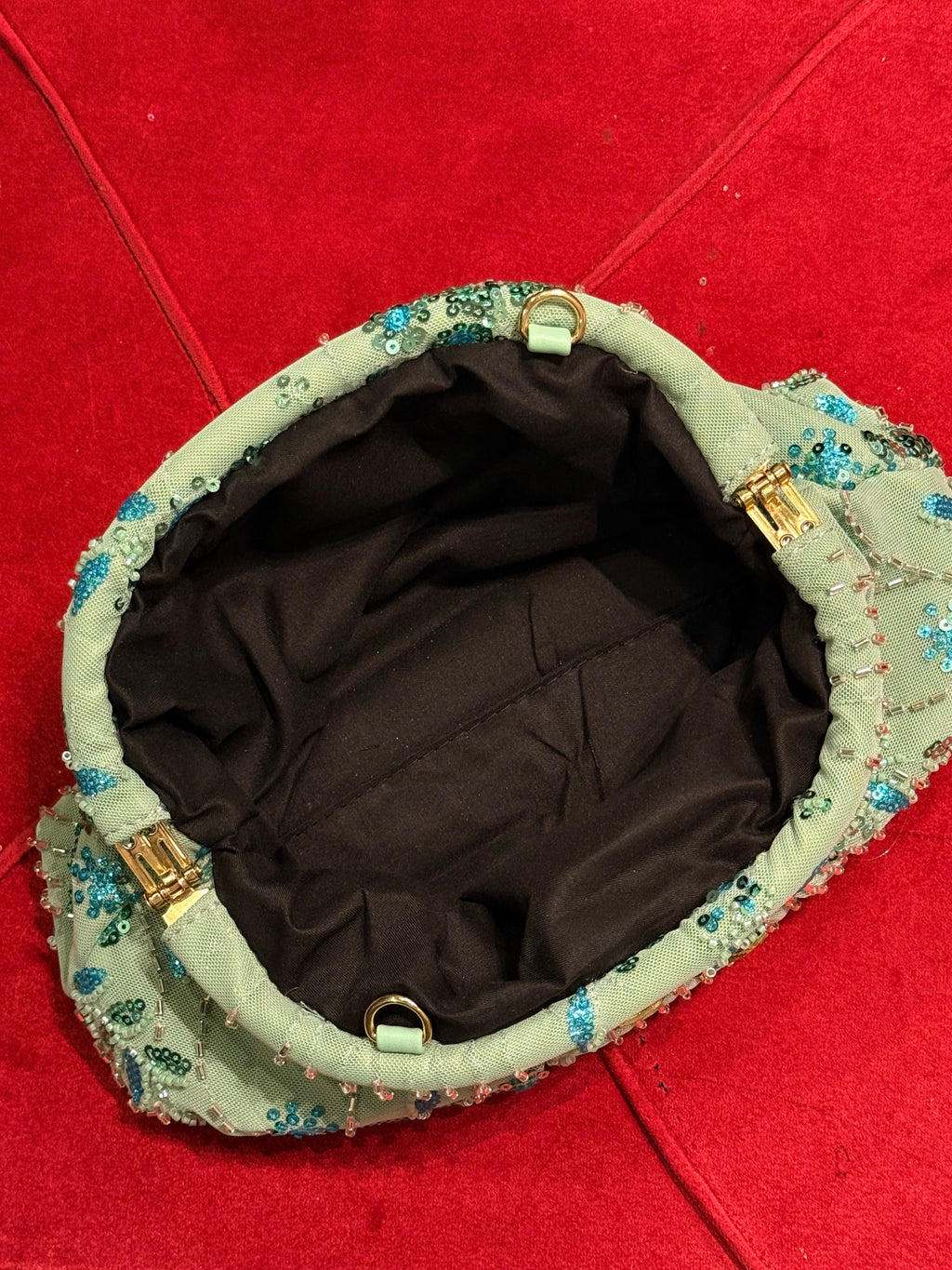 Hand embellished clutch