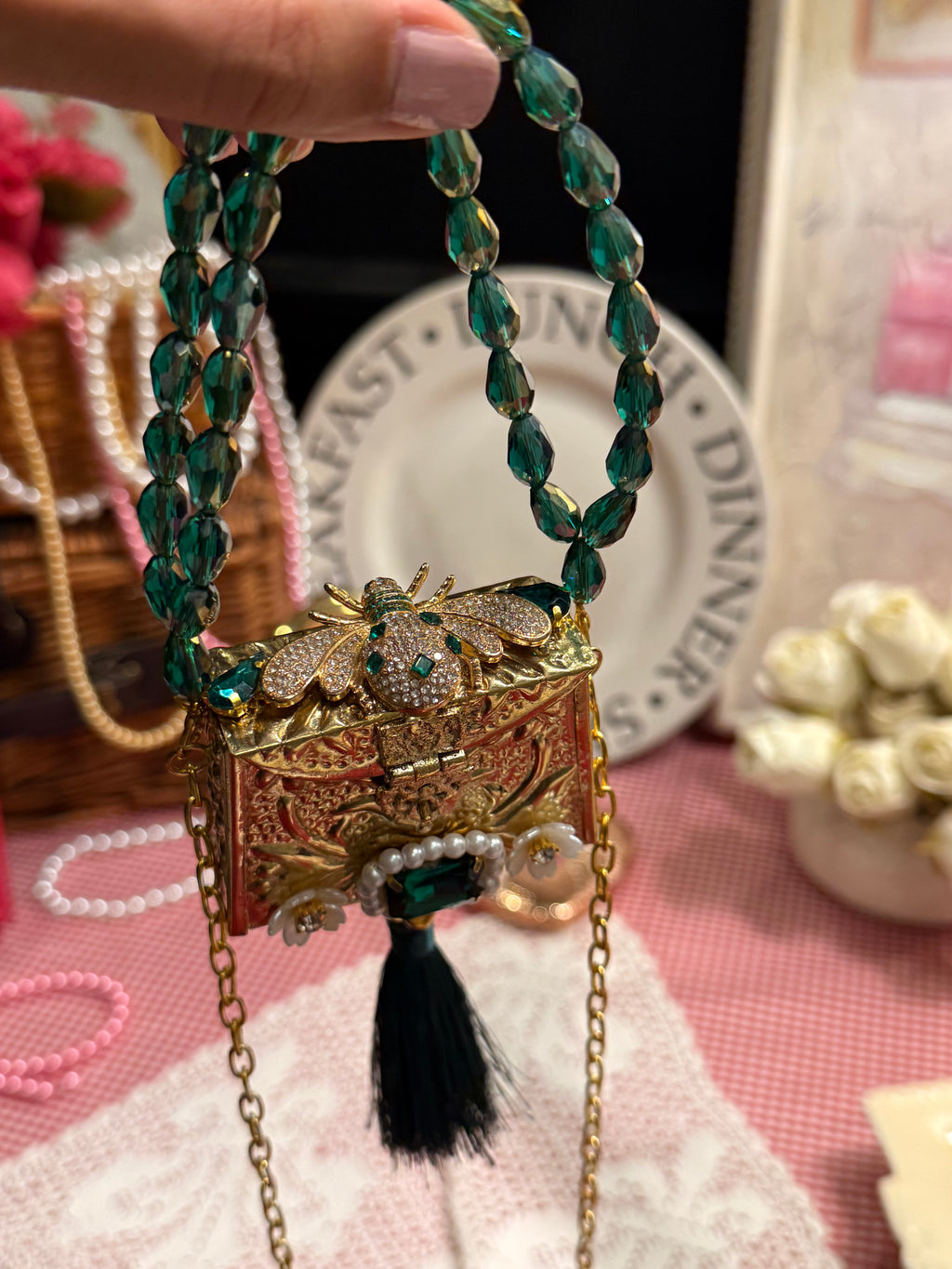 Green bug clutch with tassel