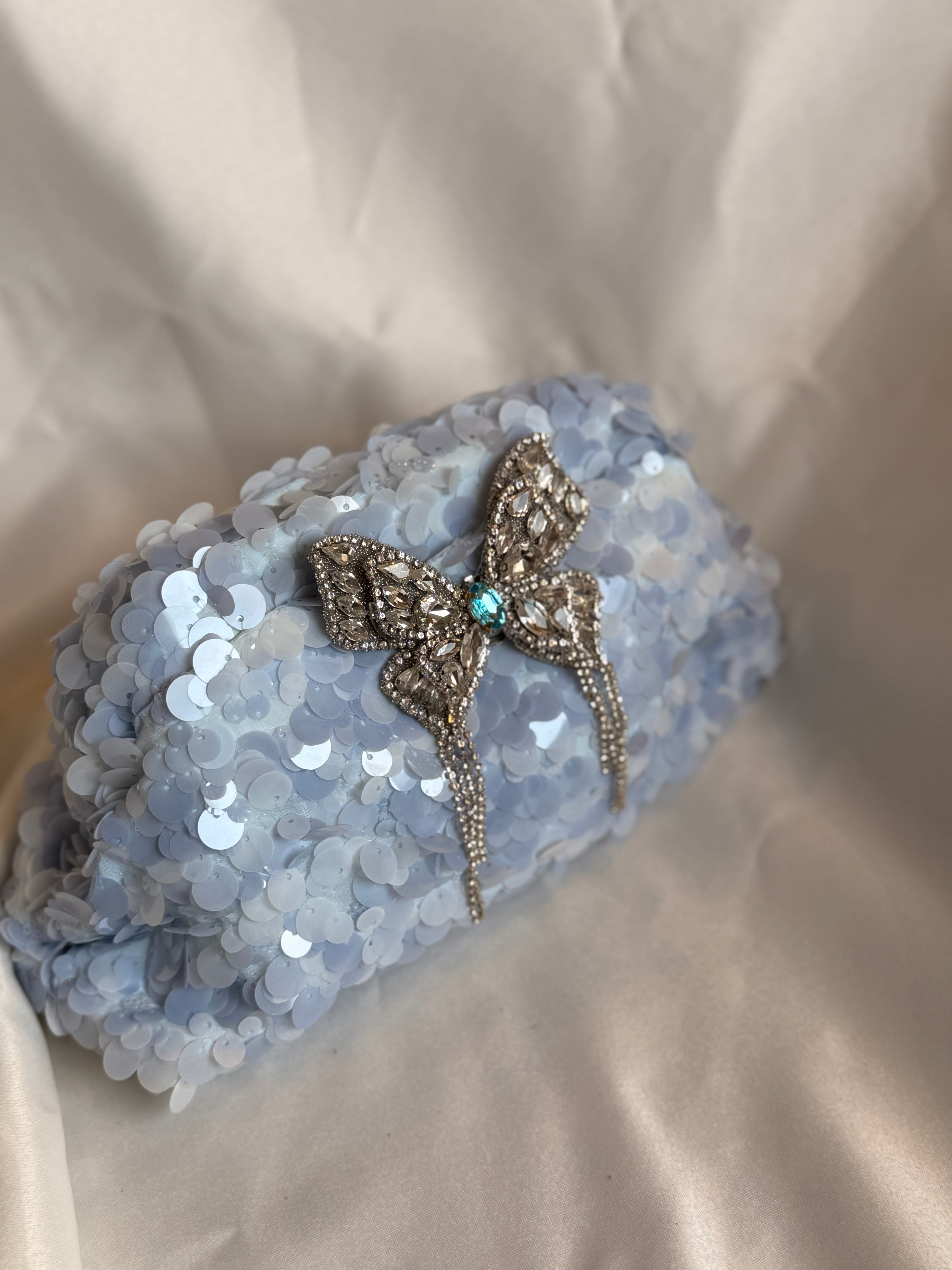Powder blue sequin clutch