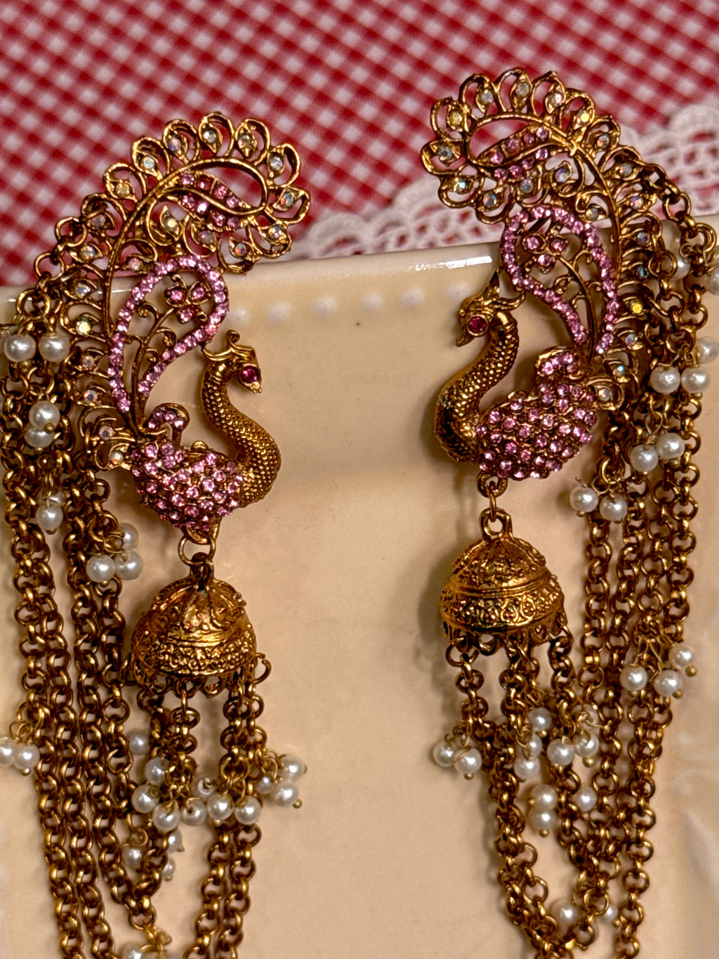 Pink peacock clip pair