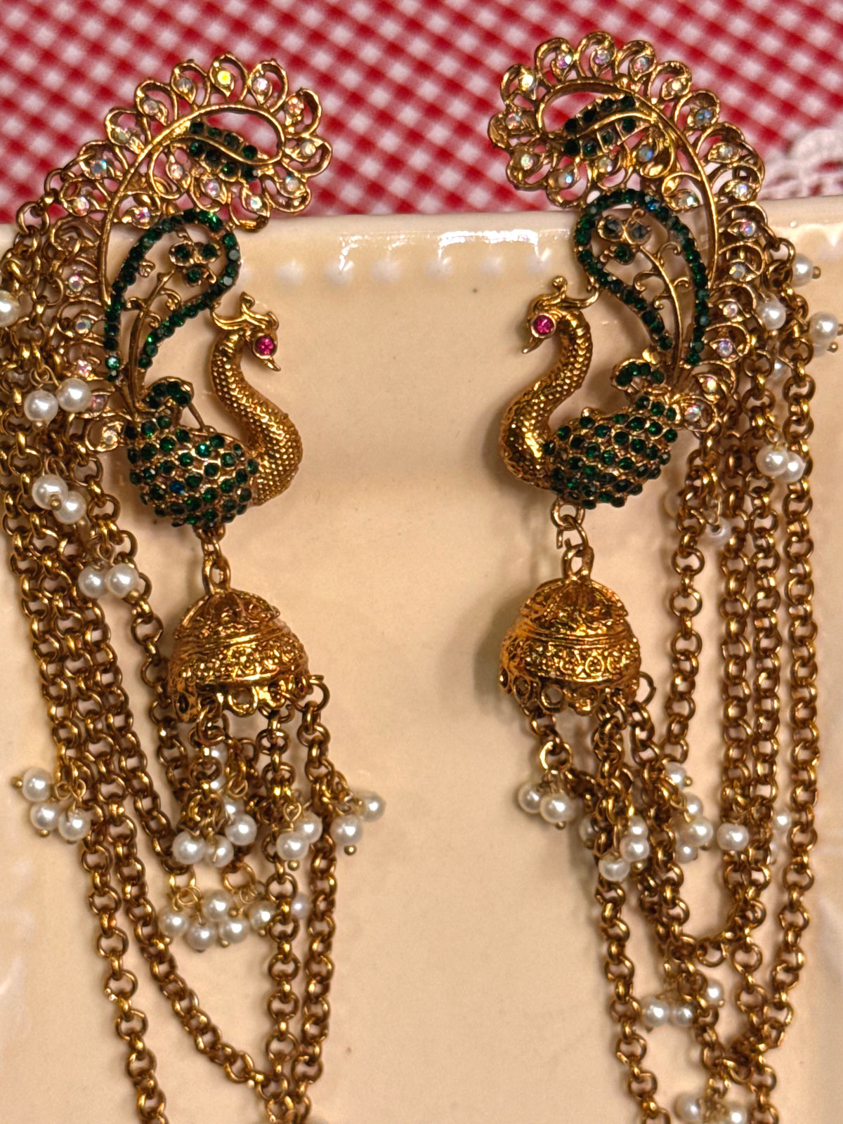 Green peacock clip pair