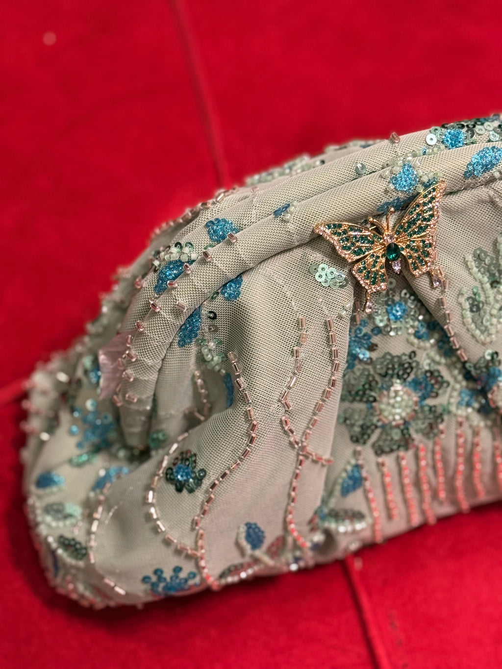Hand embellished clutch