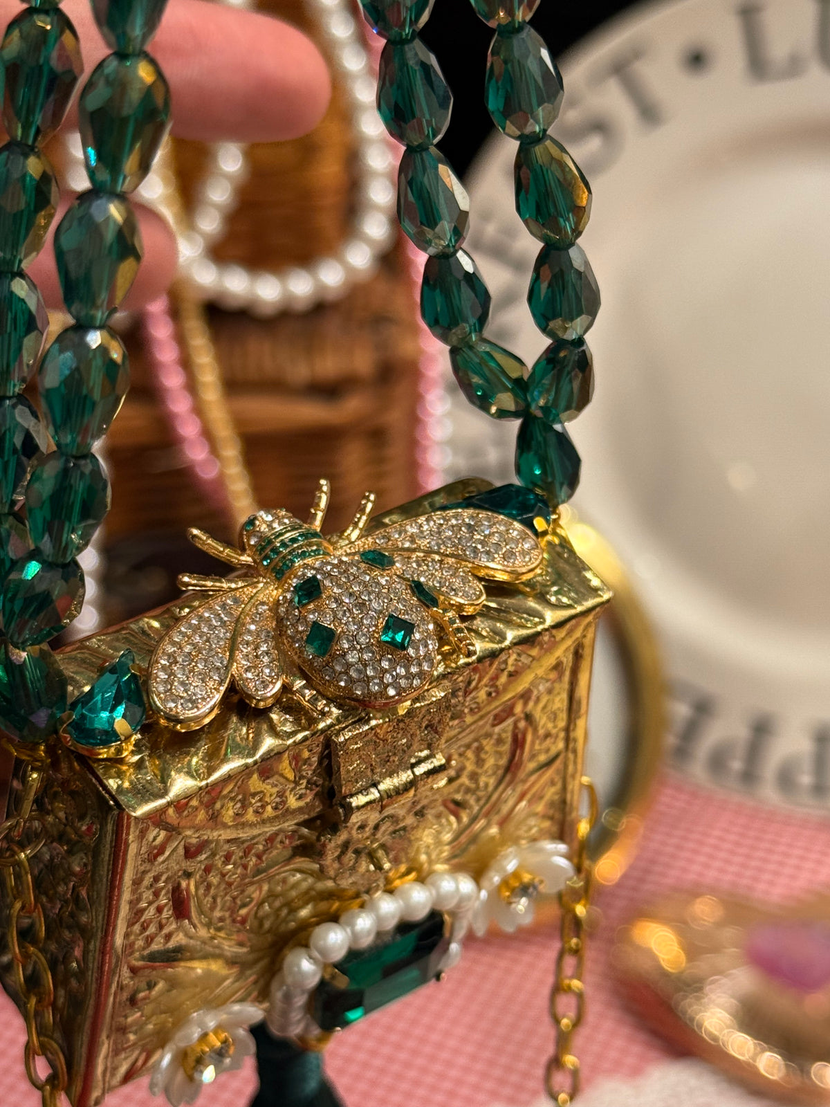 Green bug clutch with tassel