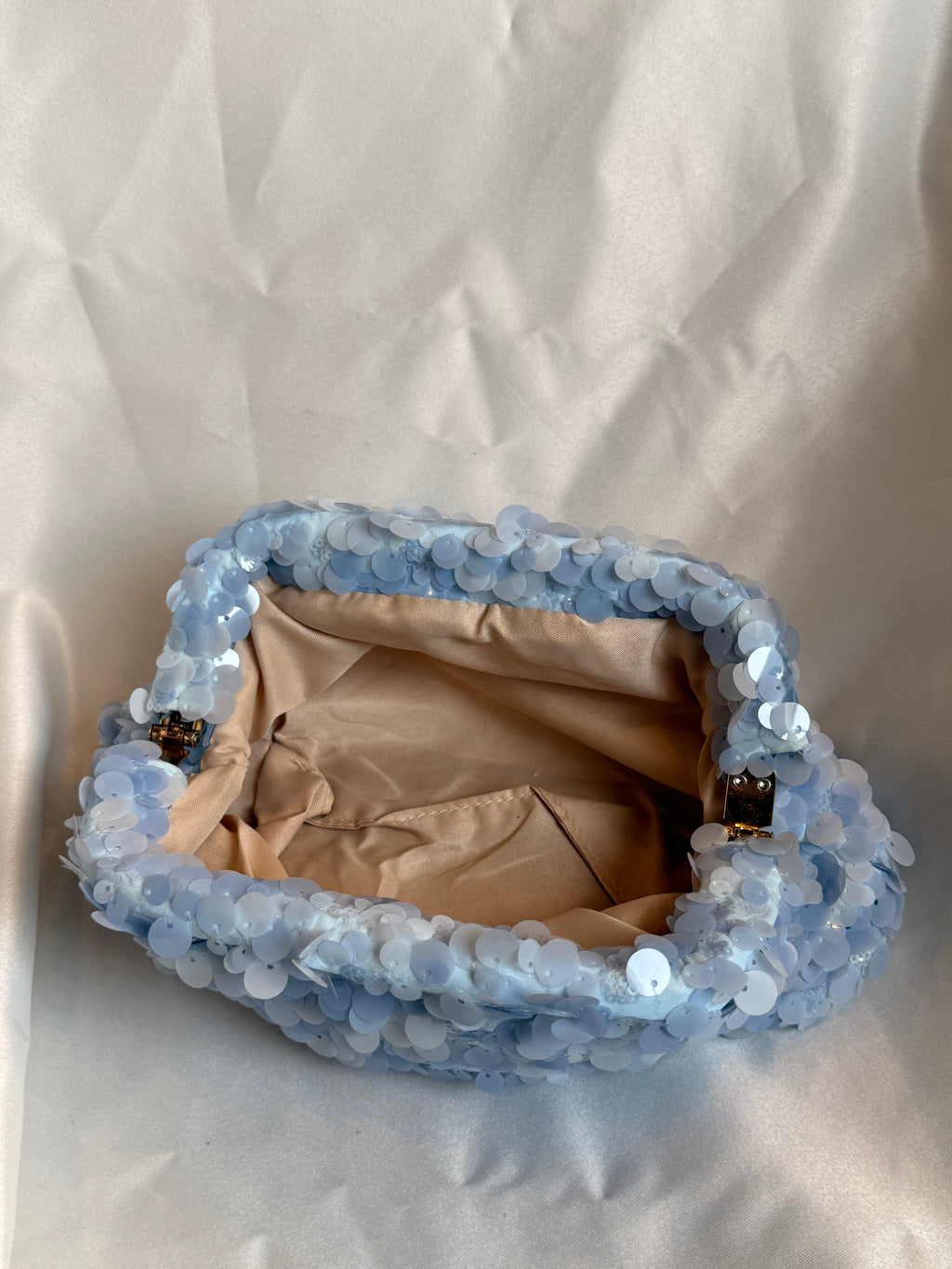 Powder blue sequin clutch