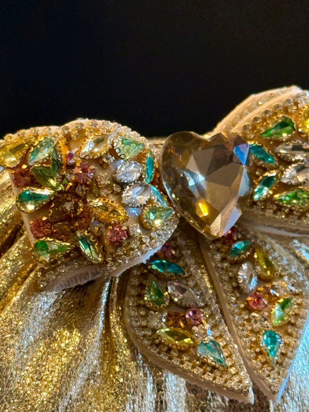 Gold clutch with multi colour bow