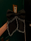 Oversized silk bow