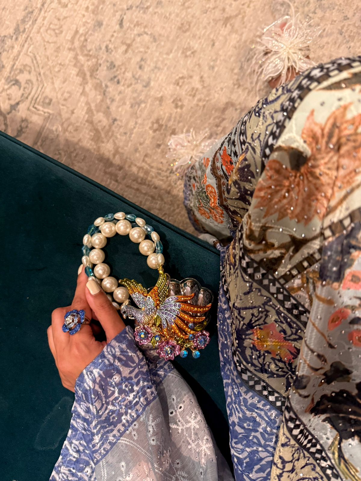 Peacock clutch