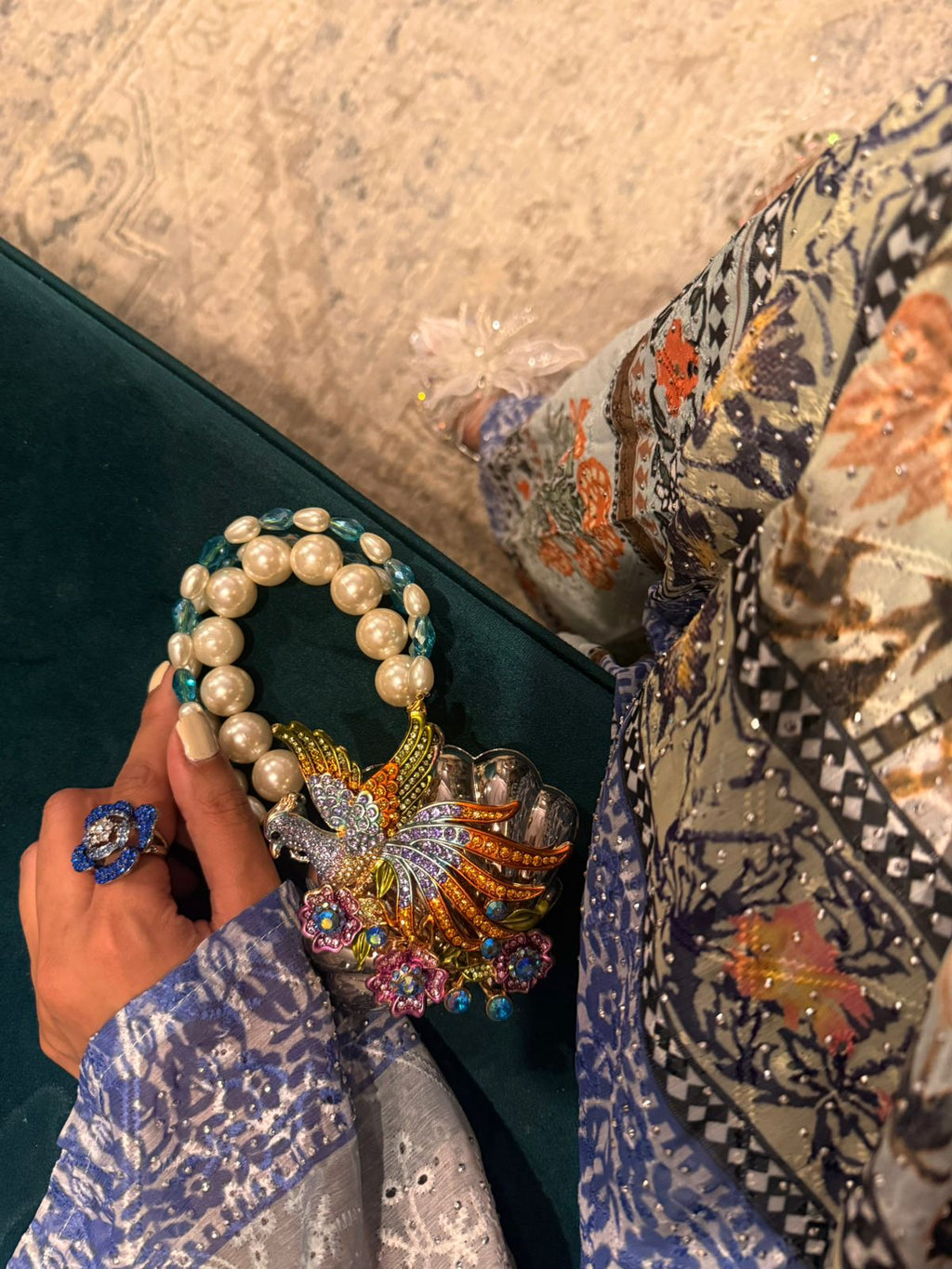 Peacock clutch