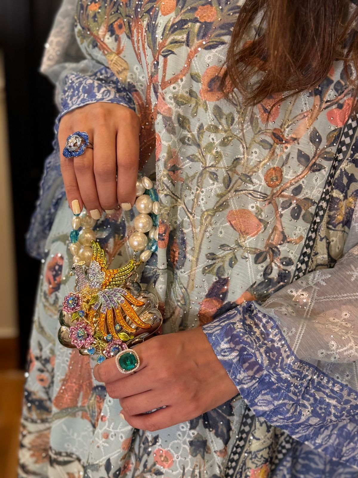 Peacock clutch