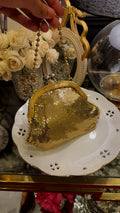 Vintage mesh gold clutch