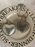 Silver mini heart clutch