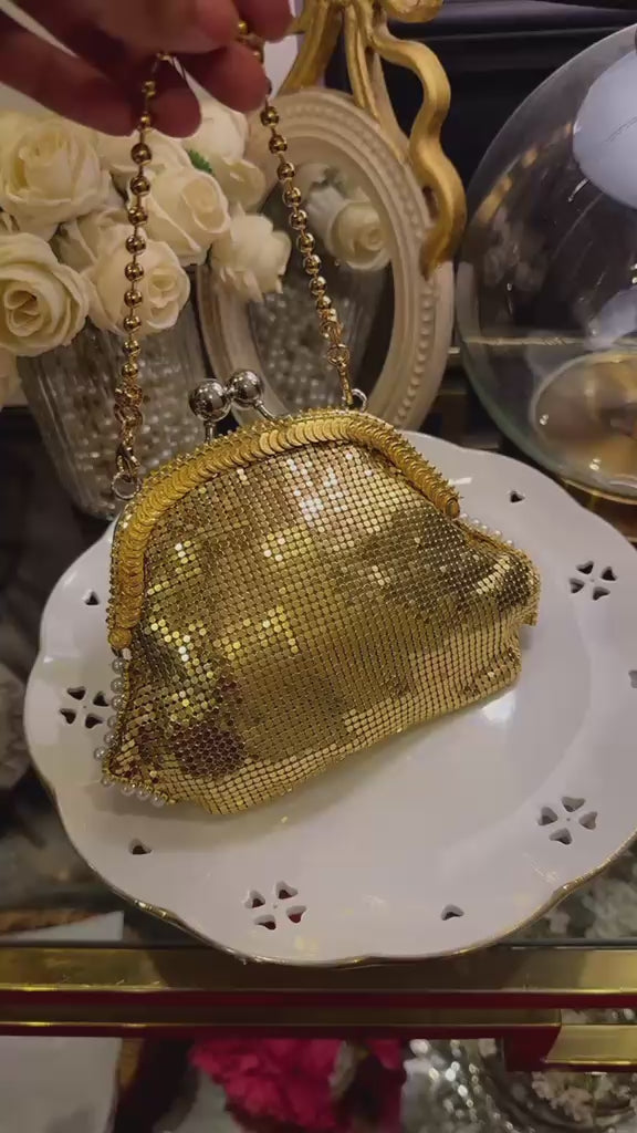 Vintage mesh gold clutch