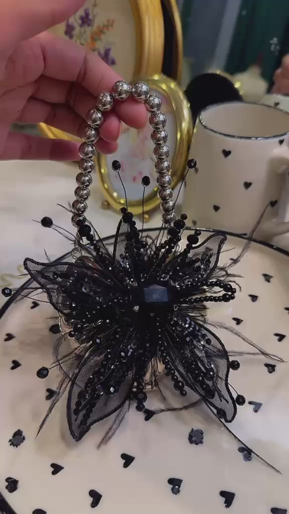 Silver micro clutch base with touch of black fur embellished