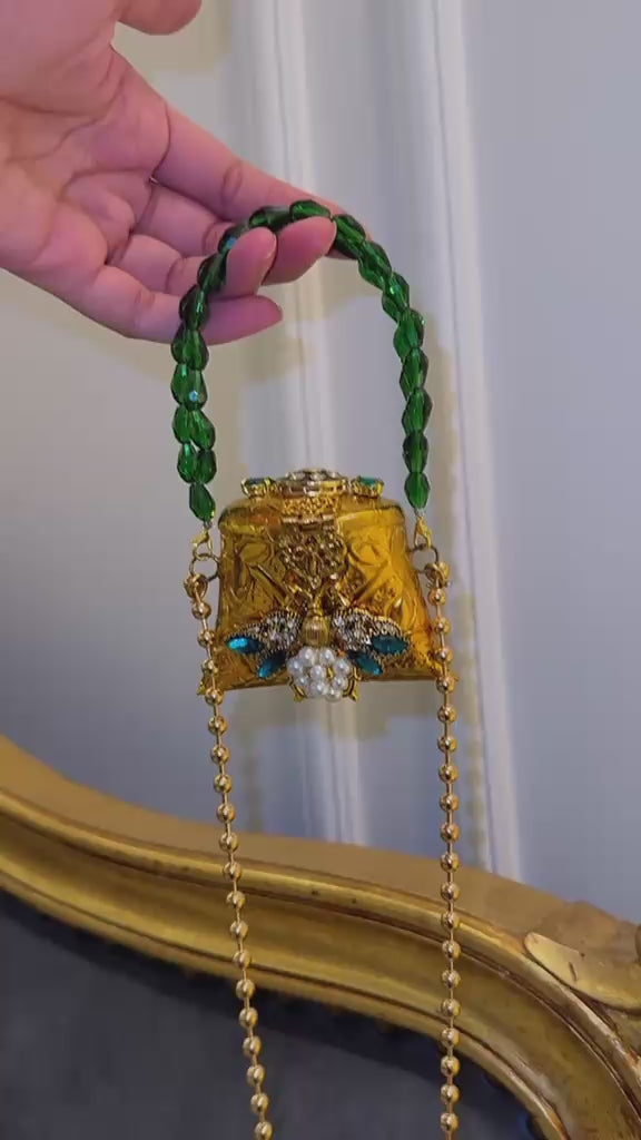 Mini nano clutch with green bug embellishments