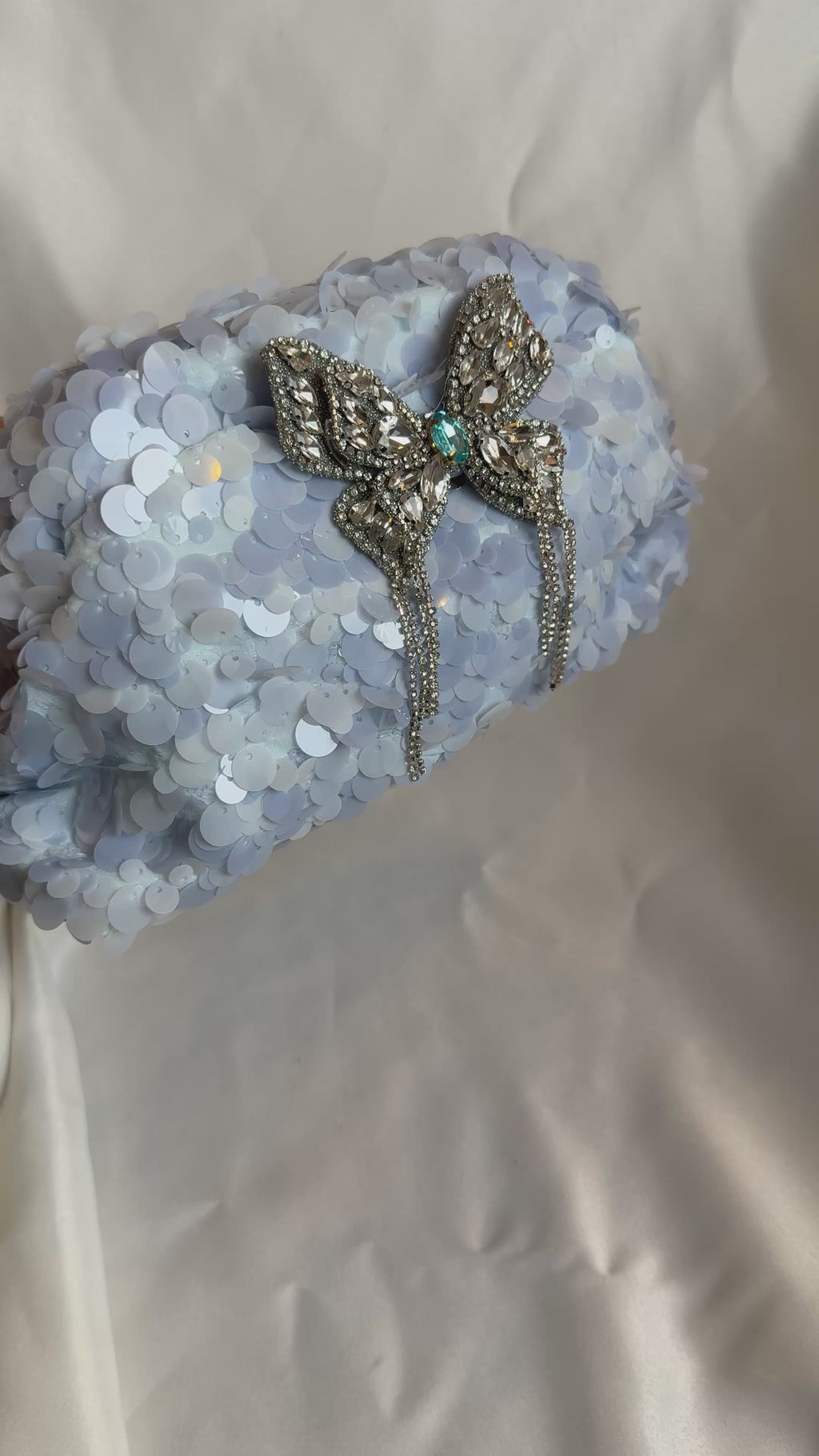 Powder blue sequin clutch