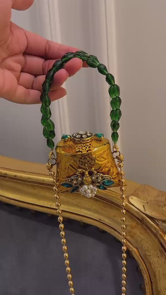 Mini nano clutch with green bug embellishments