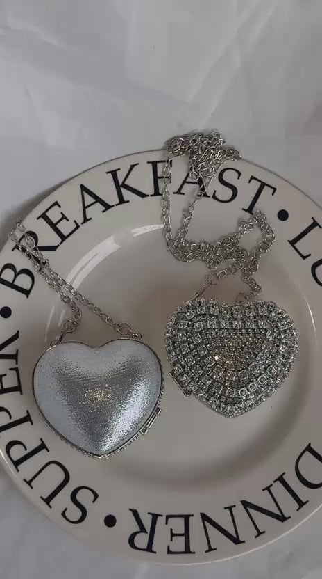 Silver mini heart clutch